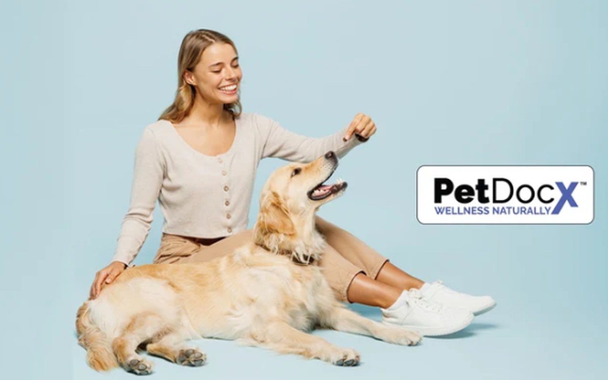 Woman with her golden retriever, PetDocX Wellness Naturally logo